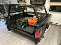 IRONHAUL slide-out truck bed cargo trays in a real rear-facing pickup bed installation