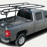 TrailFX heavy-duty contractor ladder rack installed on a silver pickup truck