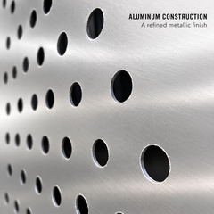 Close-up of IRONHAUL aluminum van partition showing circular perforations and refined silver metallic surface