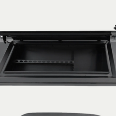 Open black IRONHAUL truck canopy tool box with divided storage compartments
