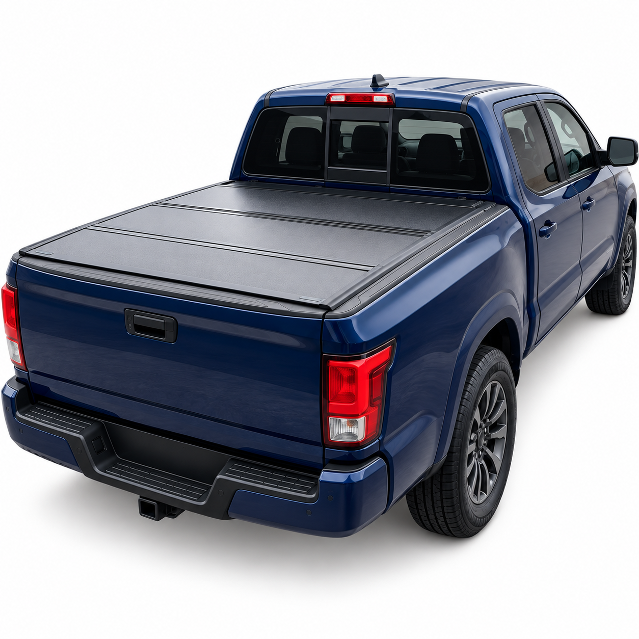 IRONHAUL hard folding flush mount tonneau cover installed on a dark blue pickup on a white background