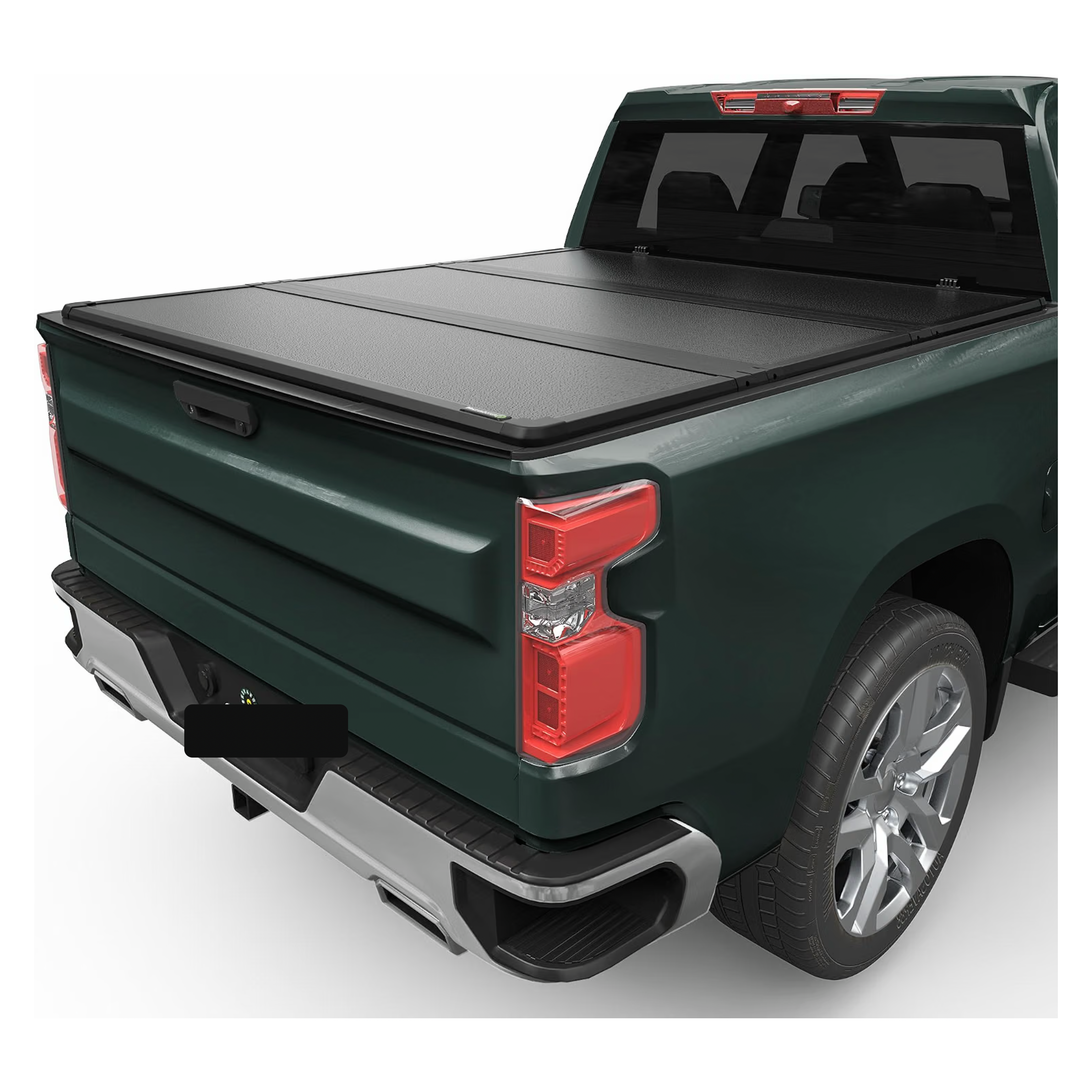 IRONHAUL hard tri-fold tonneau cover installed on a pickup truck, rear three-quarter view