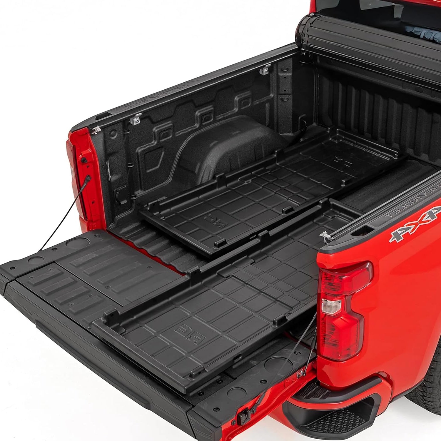 IRONHAUL two-piece slide-out truck bed cargo tray system installed in a pickup bed