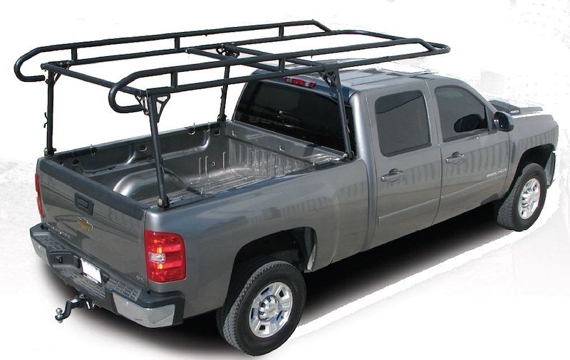 Black TrailFX heavy duty contractor ladder rack installed on a gray pickup truck